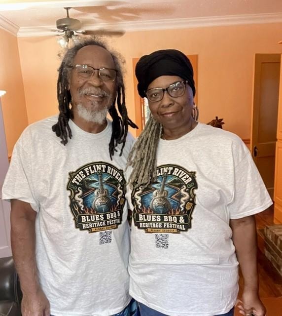 Patricia and Thomas Swain, Founders of the Flint River Blues BBQ & Heritage Festival, wearing the official festival tee